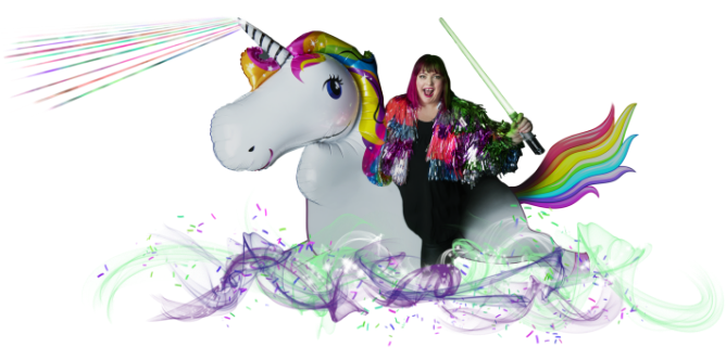 Professional Headshots & Personal Branding with Louise wearing a tinsel jacket, holding a light sabre, riding on the back of a unicorn that shoots rainbow lasers from it's horn